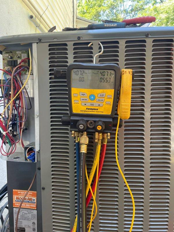 Completed installation of new HVAC air handler unit in attic space. Positioned equipment on prepared plywood flooring, secured all refrigerant line connections, and wrapped unit with reflective insulation for optimal thermal efficiency. Performed system startup and testing procedures on outdoor condensing unit, utilizing digital manifold gauges to verify proper refrigerant pressures and system operation. All electrical connections completed to manufacturer specifications and system confirmed operational.