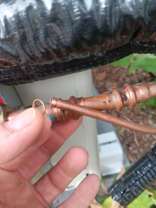 # Return for Installation Error

Responded to a warranty return for an HVAC installation error occurring within the six-month warranty period. Upon arrival, identified a faulty copper refrigerant line connection that had been improperly installed during the original system setup. The copper fitting showed premature oxidation and discoloration inconsistent with normal aging, indicating installation defects.

Removed the defective copper connector assembly from the outdoor condensing unit. Utilized Fieldpiece SMAN refrigerant manifold gauge set to verify system pressures and diagnose refrigerant line issues. Readings confirmed abnormal pressure levels resulting from the compromised connection. Replaced the faulty copper fitting with properly sized components and executed correct brazing procedures to ensure leak-free joints. Evacuated the system using appropriate vacuum procedures, then recharged with manufacturer-specified refrigerant to proper levels. Verified all connections tested le