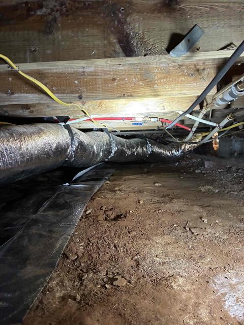 We completed a comprehensive home energy efficiency and crawl space upgrade to improve comfort, indoor air quality, and energy savings. In the attic, we air sealed gaps and penetrations, installed 25 recessed can light covers, vented three bathroom exhaust fans to the soffit, and added blown-in cellulose insulation to achieve an R-38 insulation value. In the crawl space, we air sealed the subfloor, installed R-19 batt insulation, and covered 100% of the crawl space floor with a durable 12-mil vapor barrier to help control moisture. We also installed a Santa Fe Oasis 105 crawl space dehumidifier with dedicated ductwork and damper for balanced airflow, along with a new insulated crawl space door.
