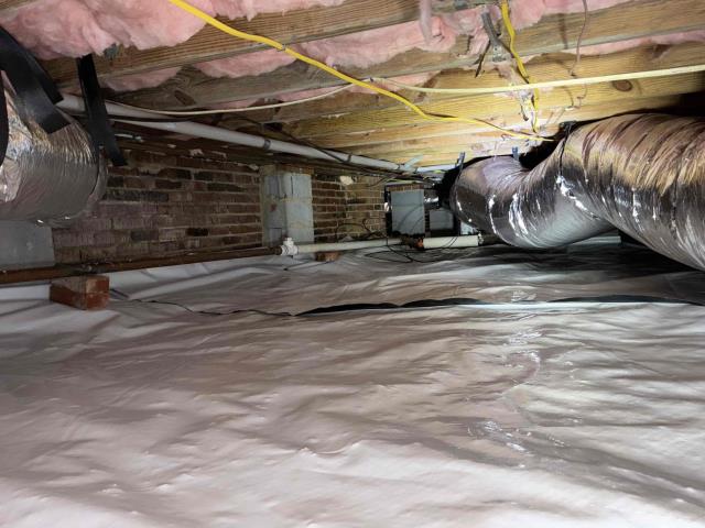 We completed a comprehensive home energy efficiency and crawl space upgrade to improve comfort, indoor air quality, and energy savings. In the attic, we air sealed gaps and penetrations, installed 25 recessed can light covers, vented three bathroom exhaust fans to the soffit, and added blown-in cellulose insulation to achieve an R-38 insulation value. In the crawl space, we air sealed the subfloor, installed R-19 batt insulation, and covered 100% of the crawl space floor with a durable 12-mil vapor barrier to help control moisture. We also installed a Santa Fe Oasis 105 crawl space dehumidifier with dedicated ductwork and damper for balanced airflow, along with a new insulated crawl space door.