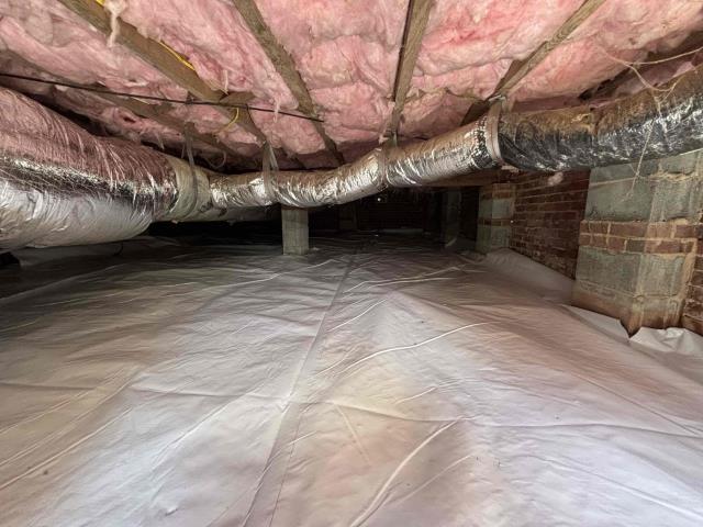 We completed a crawl space moisture and humidity control project to help create a cleaner, drier environment beneath the home. Our team cleaned out the crawl space, installed a durable 12-mil vapor barrier, added foundation vent covers, and installed a crawl space dehumidifier near the center of the space for effective humidity control.