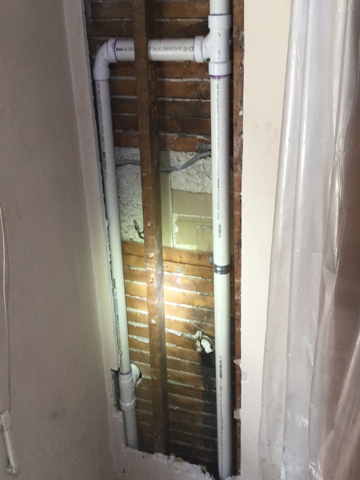 Replacement of cast iron and galvanized kitchen waste stack from basement to roof flashing with PVC plastic pipping single family home.  Replacement of cast iron and galvanized kitchen waste stack from basement to roof flashing with PVC plastic pipping single family home.