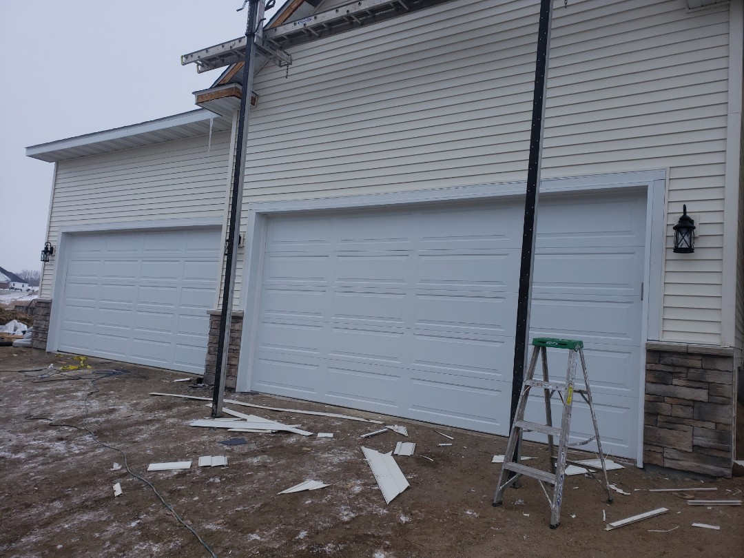 Buffalo, MN - Jon installed 2- 16x8 Long Panel Garage Doors