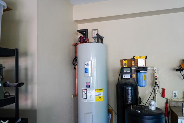 I recently completed a job as a plumber. I supplied and installed a new 50-gallon Bradford White tank-style natural gas, gravity water heater. I removed and disposed of the old tank. I supplied and installed a new 3/4" cold water shut-off valve. I installed new water heater pans, gas flex lines, and a full-port drain valve with a hose connection. I also upgraded the drain valve to a full-port drain valve with a hose connection. 