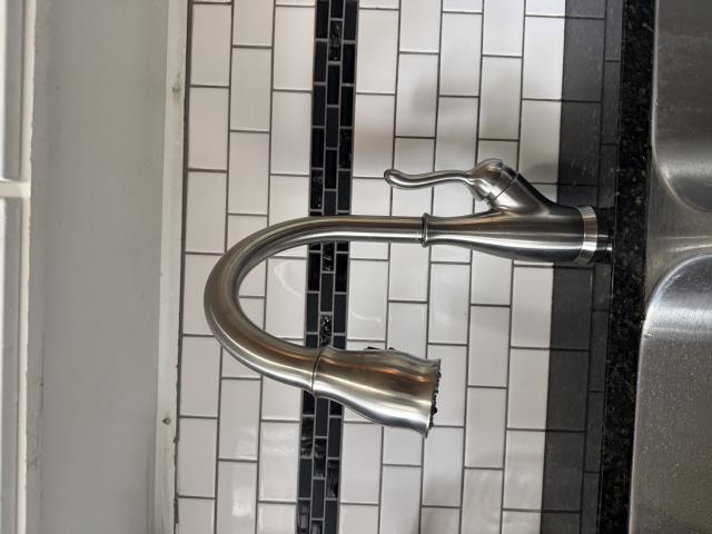 I replaced the old kitchen faucet with a new Delta Leland model. The old one was corroded, so I had to cut it out. After installation, I checked for leaks and ensured everything worked perfectly.