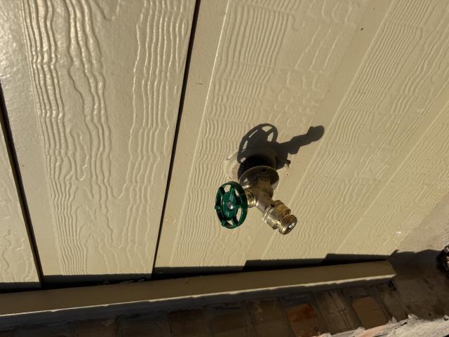I replaced an old outdoor spigot with a new one, ensuring it had a code-approved vacuum breaker. The old spigot was safely removed and disposed of.