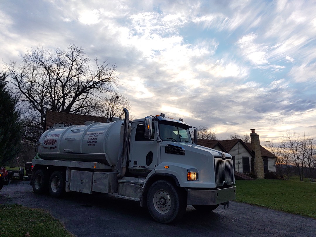Pump and clean septic tank