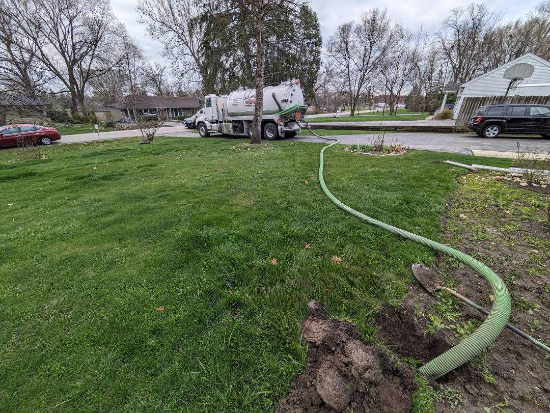 Pump and clean septic tank 