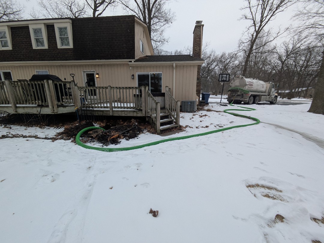 pump and clean 2 septic tanks 