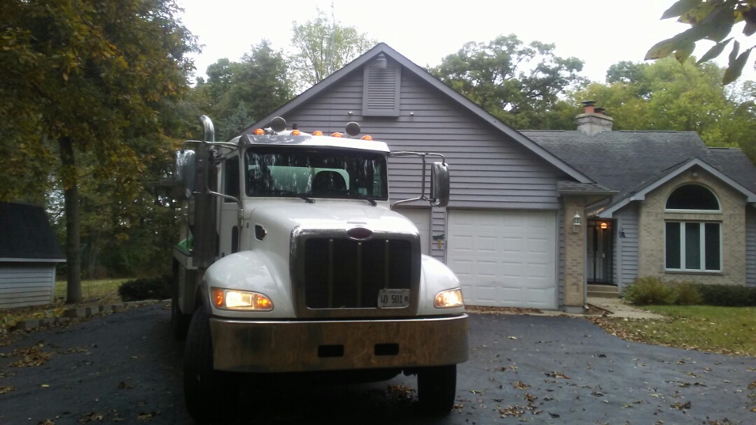 Pump and clean septic tank