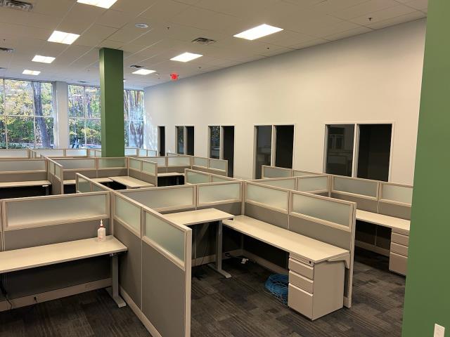 Cubicle.  Adding privacy frost film.  Before and after.