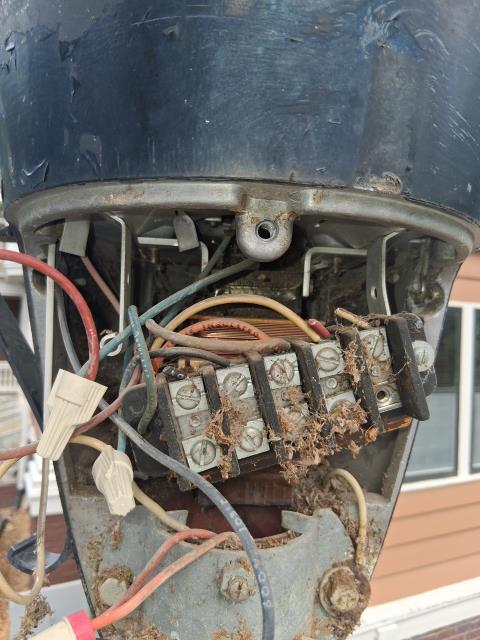 We retrofitted vintage GE lights, preserving their charm while ensuring modern functionality. Installed seven new photocells for efficient operation. Lights now run on 120v, powered by a 208 breaker.