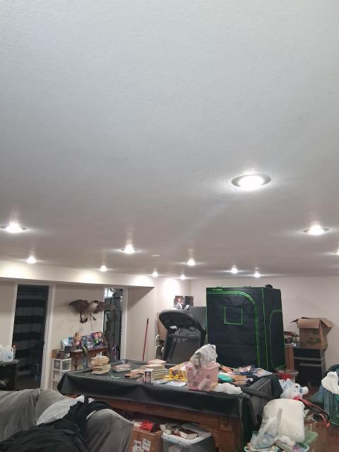 We inspected flickering LED can lights, installed two years ago. After evaluation, we concluded the issue was due to faulty bulbs.