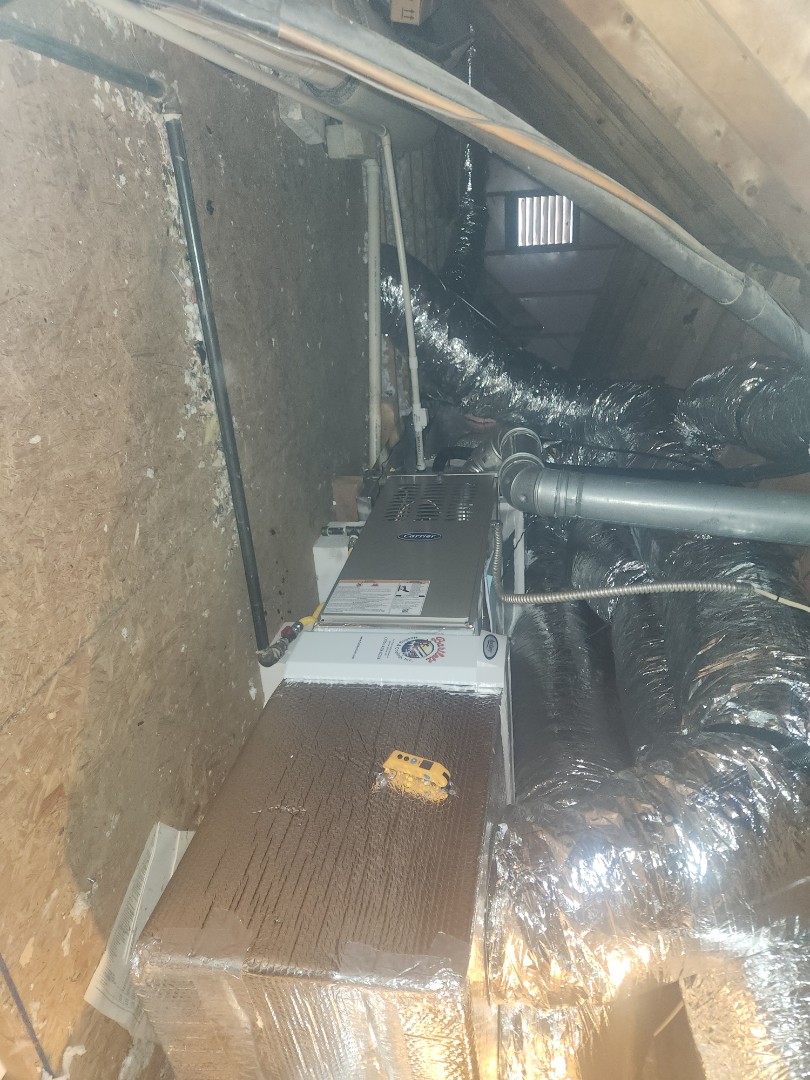 Marietta, GA - Installed 2 new Carrier 15 seer condensers with Carrier gas furnaces and Aprilaire media filters 