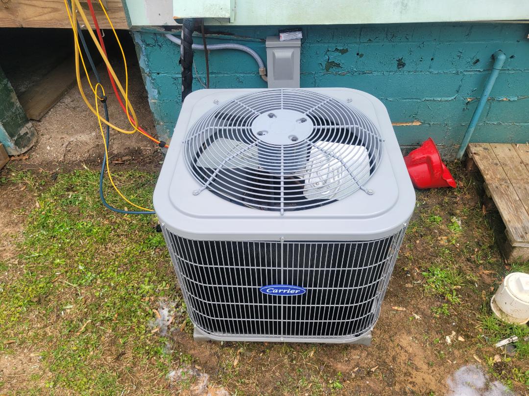 Marietta, GA - Performed AC Maintenance on a Carrier Condensing Unit and removed all debris from bottom of condensing unit,  Marietta 