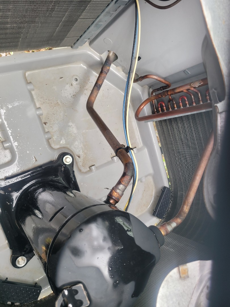 Marietta, GA - Performed AC Maintenance on a Carrier Condensing Unit and removed all debris from bottom of condensing unit,  Marietta 