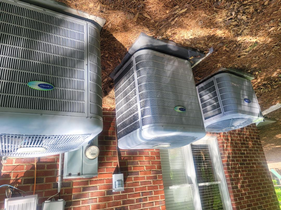 Marietta, GA - Performed AC Maintenance on 2 Carrier Infinity Condensing Units and 1 Carrier Heat Pump  and removed all debris from bottom of condensing Units.  Marietta 