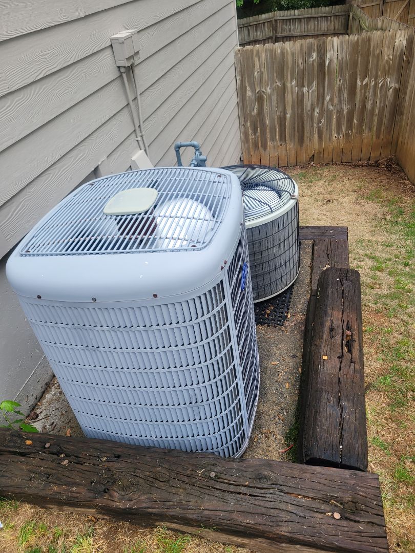 Kennesaw, GA - Performed AC Maintenance on a Carrier and a Payne Condensing units and removed all debris from bottom of condensing Units.  Kennesaw 