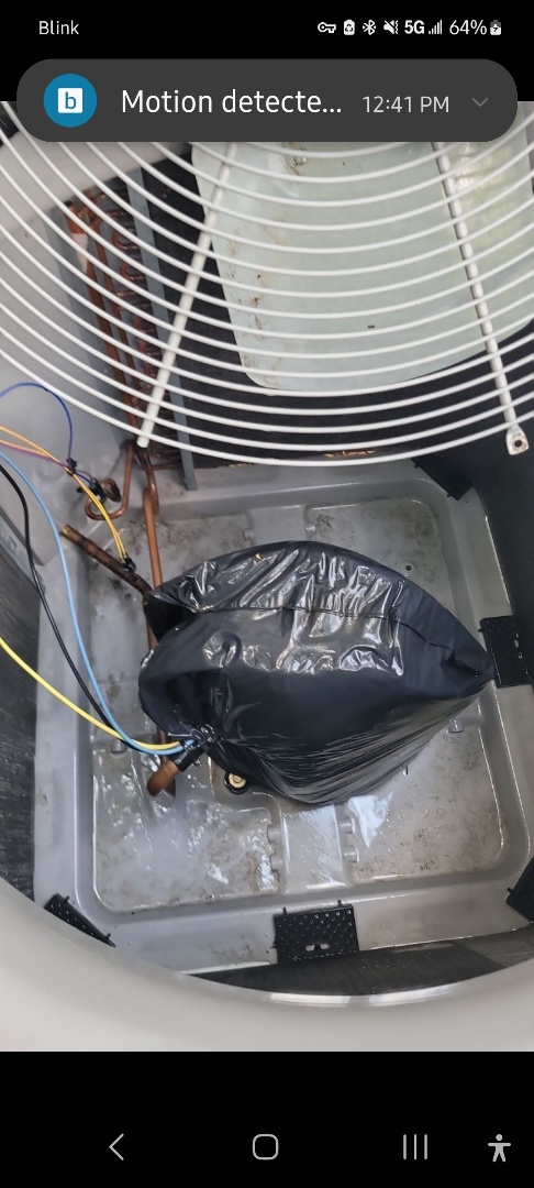 Marietta, GA - Performed AC Maintenance on a Carrier Condensing Unit and removed all debris from bottom of condensing unit.  Marietta 