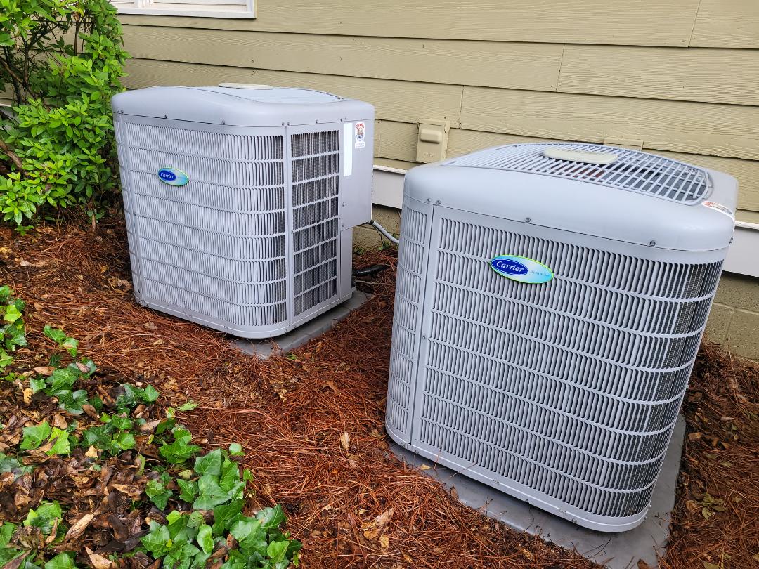 Marietta, GA - Performed AC Maintenance on 2 Infinity Carrier Condensing Units and removed all debris from bottom of condensing Units.  Marietta 