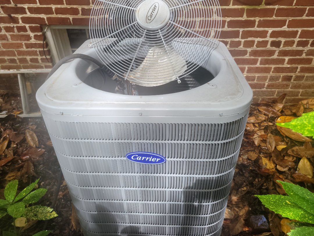 Marietta, GA - Performed AC Maintenance on Carrier Heat Pump and removed all debris from bottom of condensing unit.  Marietta 