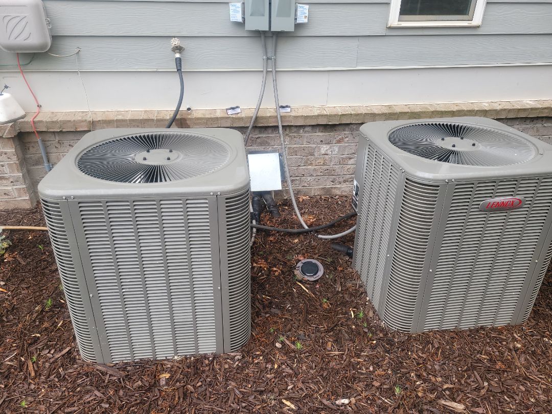 Marietta, GA - Performed AC Maintenance on 2 Lennox Condensing Units and removed all debris from bottom of condensing Units.  Marietta 