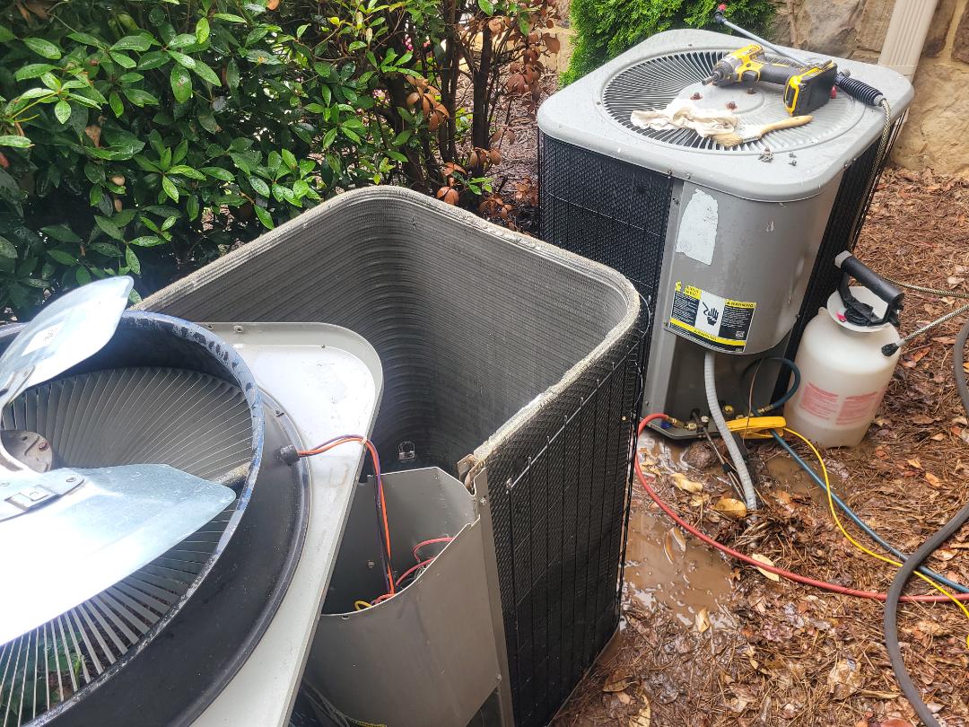 Marietta, GA - Performed AC Maintenance on 2 Lennox Condensing Units and removed all debris from bottom of condensing Units.  Marietta 