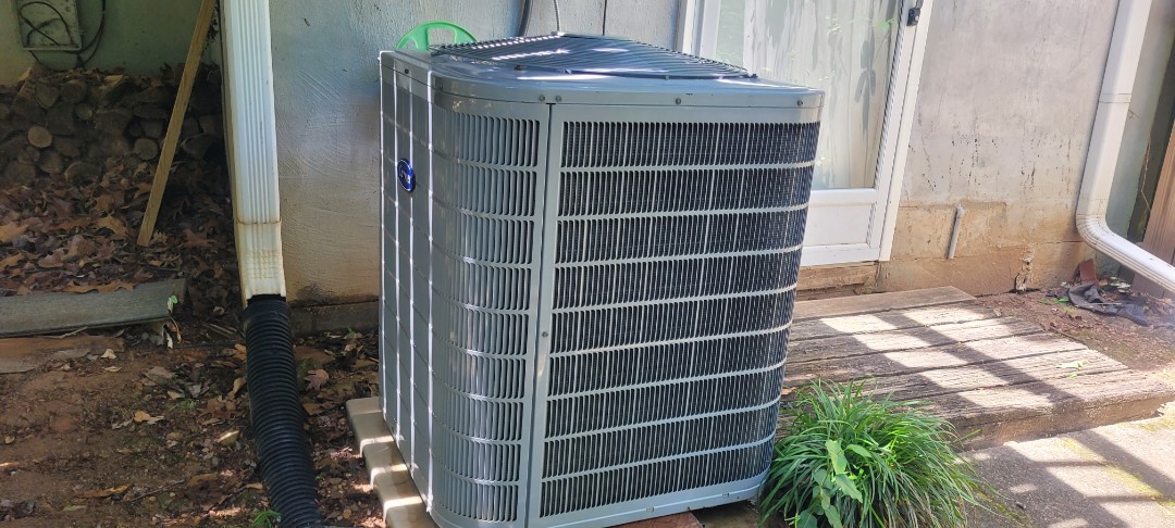 Smyrna, GA - Performed AC Maintenance on a Carrier Condensing Unit and removed all debris from bottom of condensing unit.  smyrna