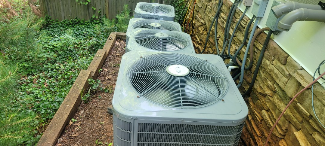 Kennesaw, GA - Performed AC Maintenance on 4 Carrier Heat Pumps and removed from bottom of condensing unit units. Kennesaw 