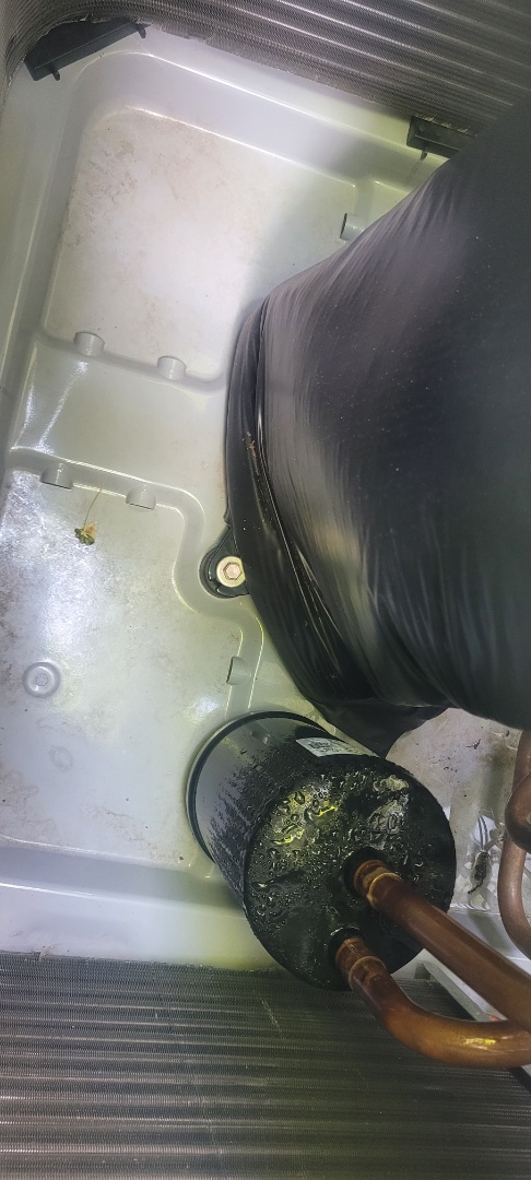 Kennesaw, GA - Performed AC Maintenance on 4 Carrier Heat Pumps and removed from bottom of condensing unit units. Kennesaw 