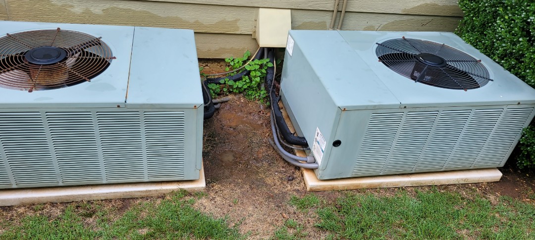 Dallas, GA - Performed AC Maintenance 2 Rheem Condensing Units and removed all debris from bottom of condensing Units.  Dallas