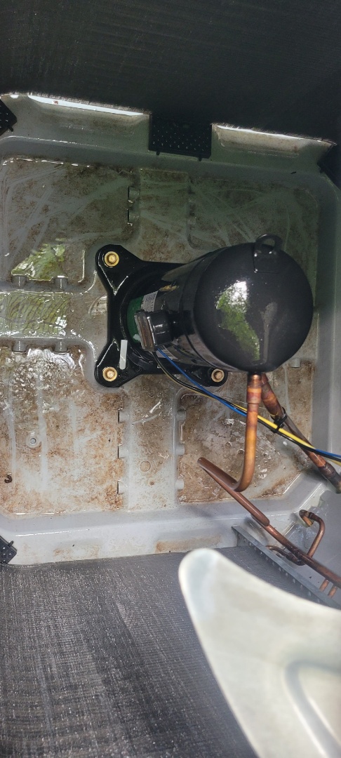 Marietta, GA - Performed AC Maintenance on a Carrier Condensing Unit and removed all debris from bottom of condensing unit.  Marietta 