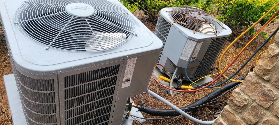 Marietta, GA - Performed AC Maintenance on 2 Carrier Condensing Units and removed all debris from bottom of condensing Units.  Marietta 