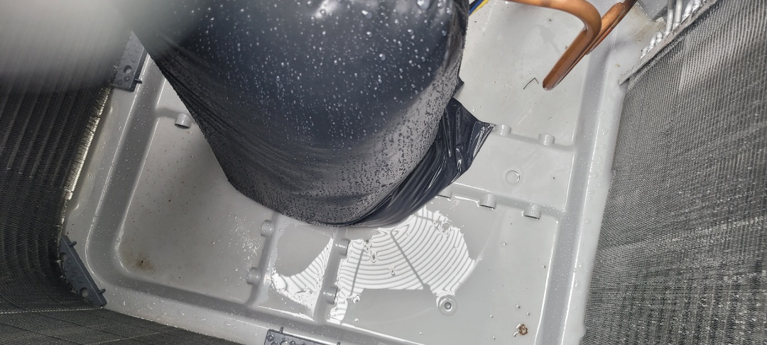 Marietta, GA - Performed AC Maintenance on 2 Carrier Condensing Units and removed all debris from bottom of condensing Units.  Marietta 