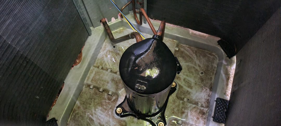 Kennesaw, GA - Performed AC Maintenance on a Carrier Condensing Unit and removed all debris from bottom of condensing unit.  Kennesaw 