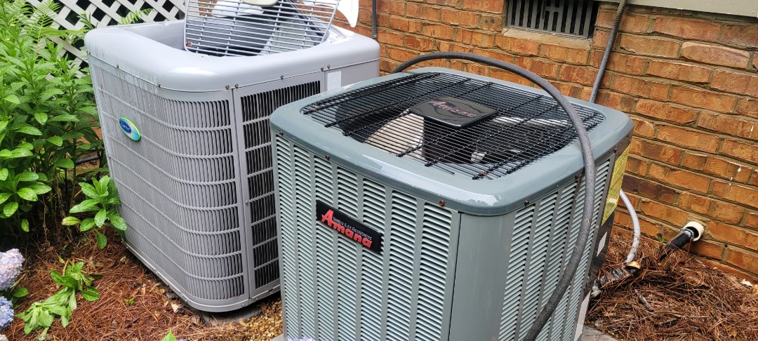 Kennesaw, GA - Performed AC Maintenance on a Carrier and a Amana Condensing Units and removed all debris from bottom of condensing Units.  Kennesaw 