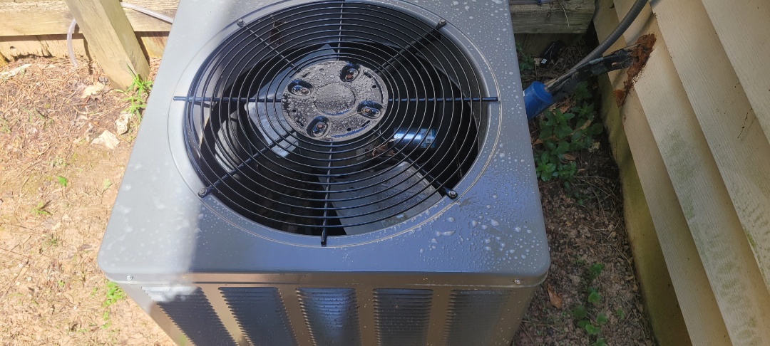 Kennesaw, GA - Performed AC Maintenance on a Rheem Condensing Unit and removed all debris from bottom of condensing unit.  