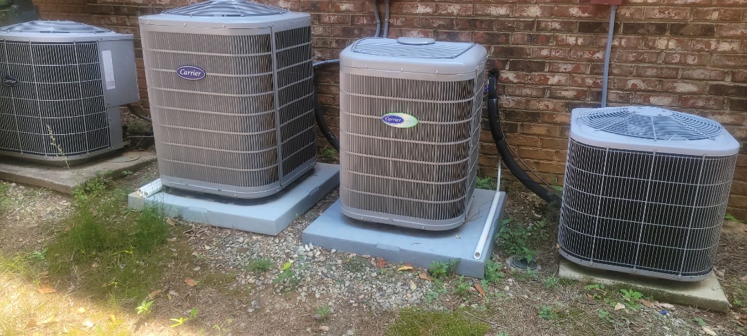 Marietta, GA - Performed AC Maintenance on 4 Carrier Condensing Units and removed all debris from bottom of condensing Units.  Marietta 