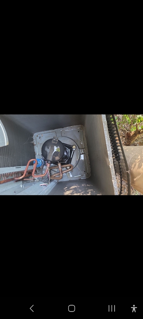 Marietta, GA - Performed AC Maintenance on a Rheem and Goodman Condensing Units and removed all debris from bottom of condensing Units.  Marietta 