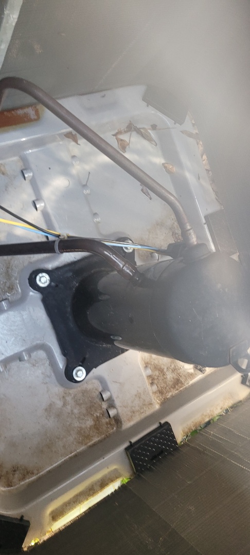 Marietta, GA - Performed AC Maintenance on a Carrier Condensing Unit and removed all debris from bottom of condensing unit.  Marietta 