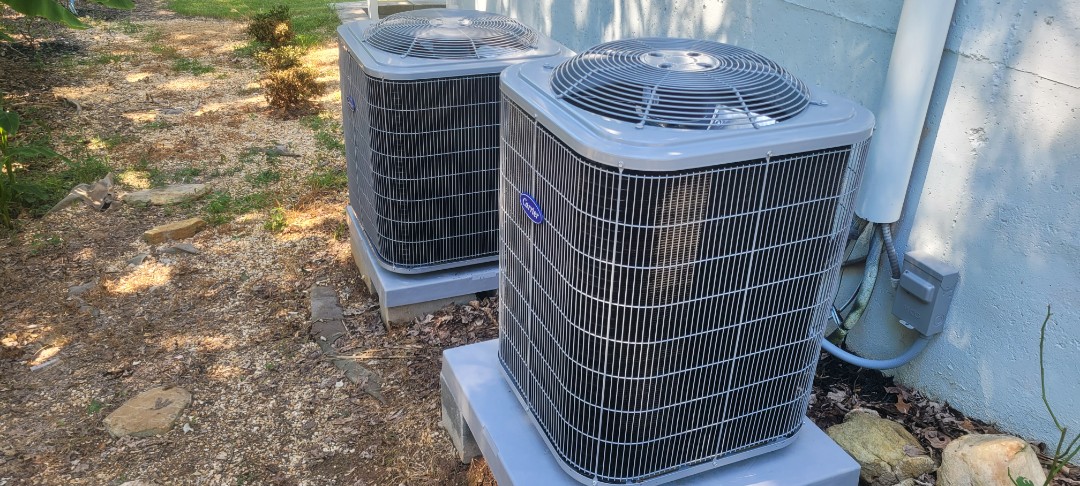 Marietta, GA - Performed AC Maintenance on 2 Carrier Condensing Units and removed all debris from bottom of condensing Units.  Marietta 