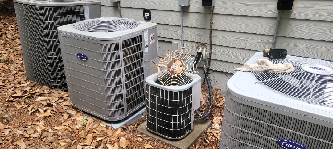 Smyrna, GA - Performed AC Maintenances on Carrier Condensing Units and removed all debris from bottom of condensing Units.  Smyrna 