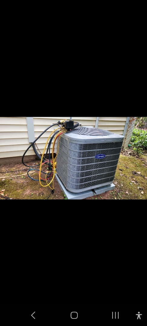 Marietta, GA - Performed AC Maintenance on a Carrier Condensing Unit and removed all debris from bottom of condensing unit.  Marietta 
