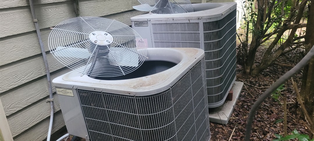 Marietta, GA - Performed AC Maintenance on 2 R22 condensing units and removed all debris from bottom of condensing Units . Marietta 