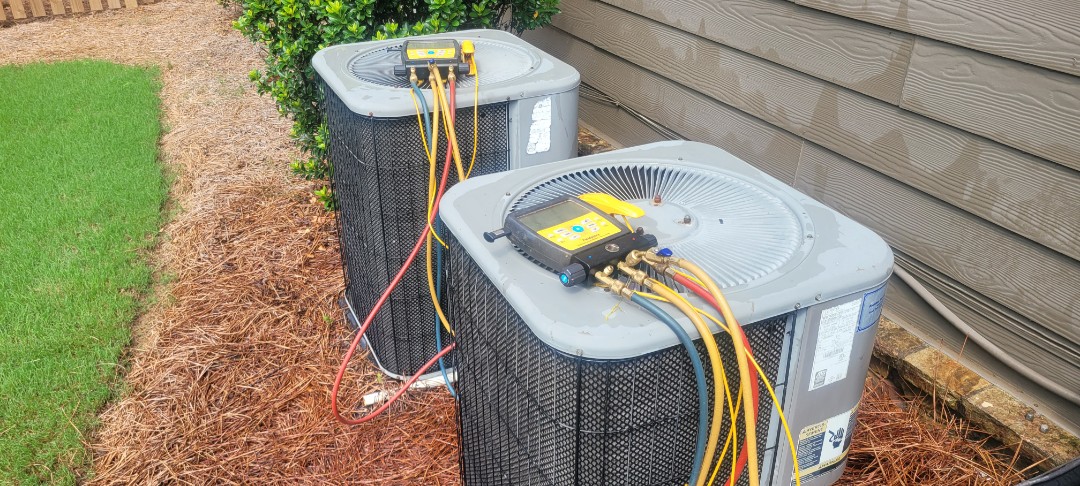 Marietta, GA - Performed AC Maintenance on 2 Leenox condensing units and removed all debris from bottom of condensing Units.  Marietta 
