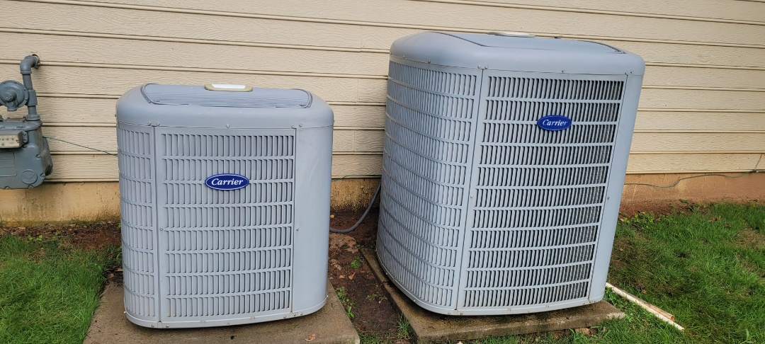 Marietta, GA - Performed AC Maintenance on 2 Carrier Infinity Condensing Units and removed all debris from bottom of units. Marietta 