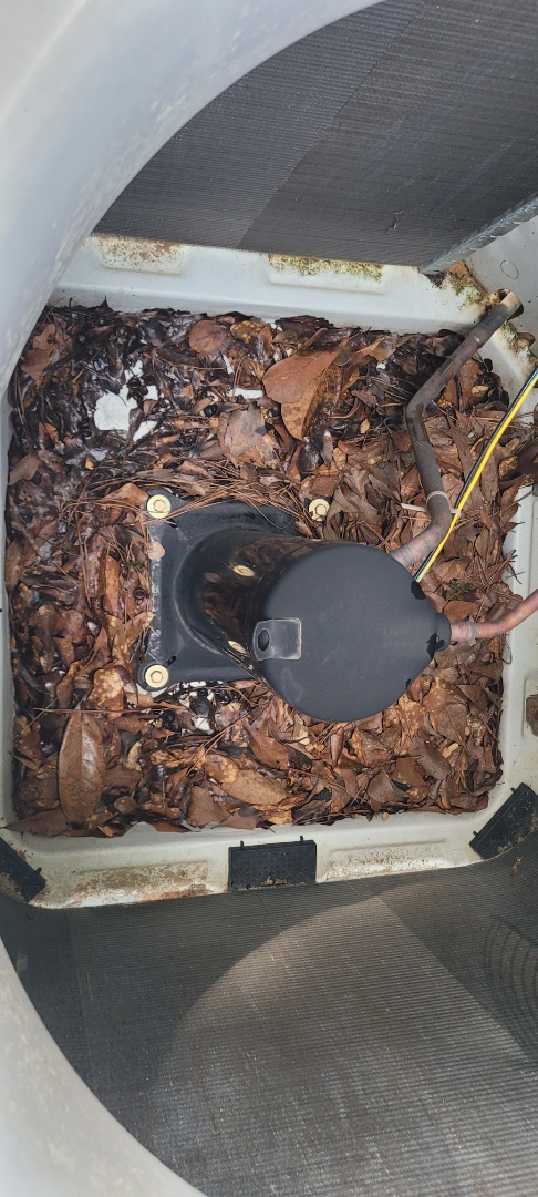 Marietta, GA - Performed AC Maintenance on a Carrier Condensing Unit and removed all debris from bottom of condensing unit.  Marietta 