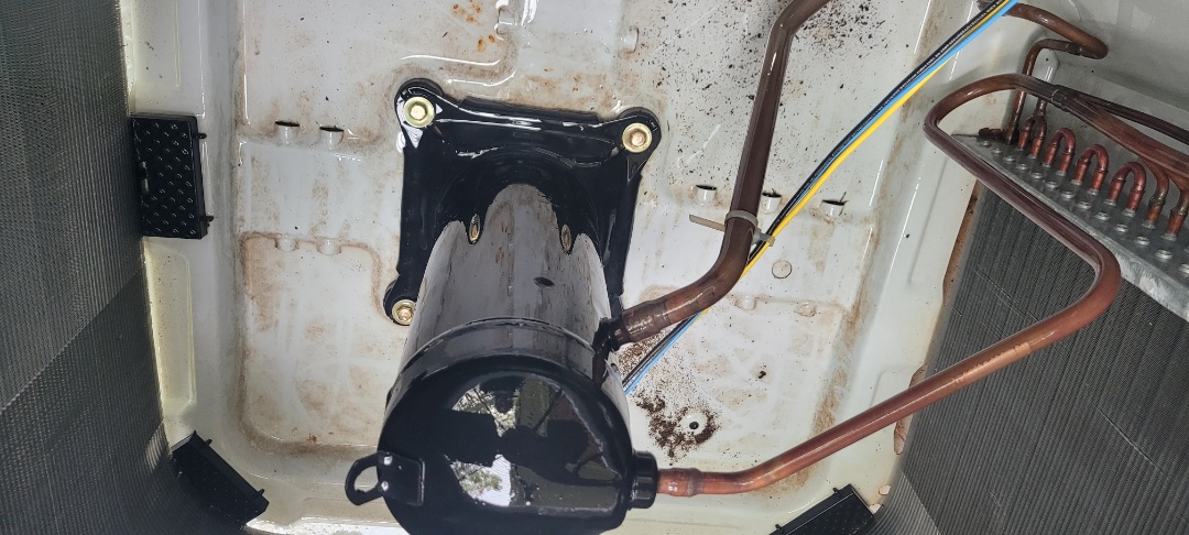 Marietta, GA - Performed AC Maintenance on a Carrier Condensing Unit and removed all debris from bottom of condensing unit.  Marietta 