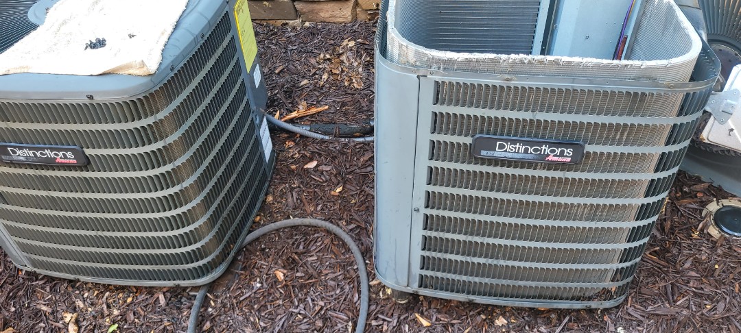 Hiram, GA - Performed AC Maintenance on 2 Amana Condensing Units and removed all debris from bottom of condensing Units.  