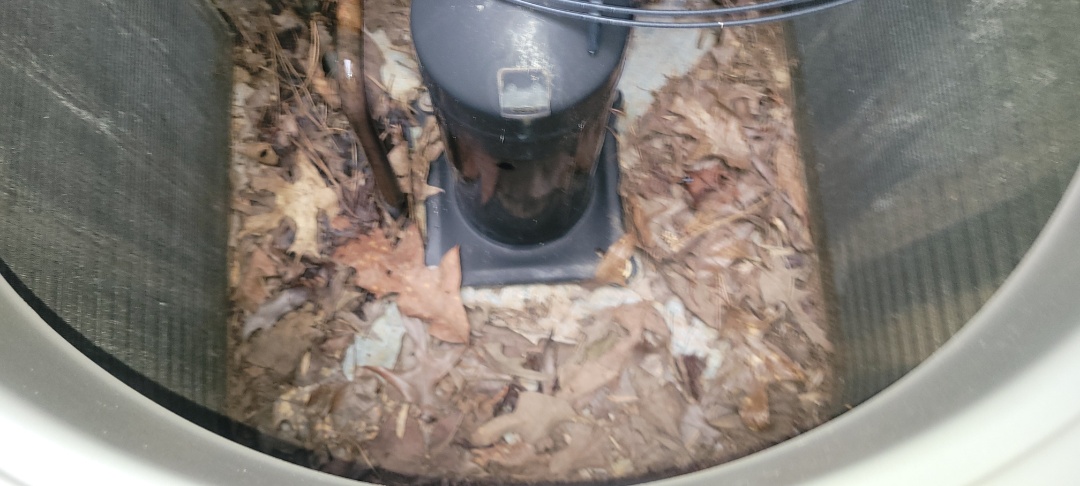 Marietta, GA - Performed AC Maintenance on a Rheem Condensing Unit and removed all debris from bottom of condensing unit.  Marietta